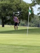 Colby Berberich was having to chip his sixth shot on the No. 18, Par 5. 